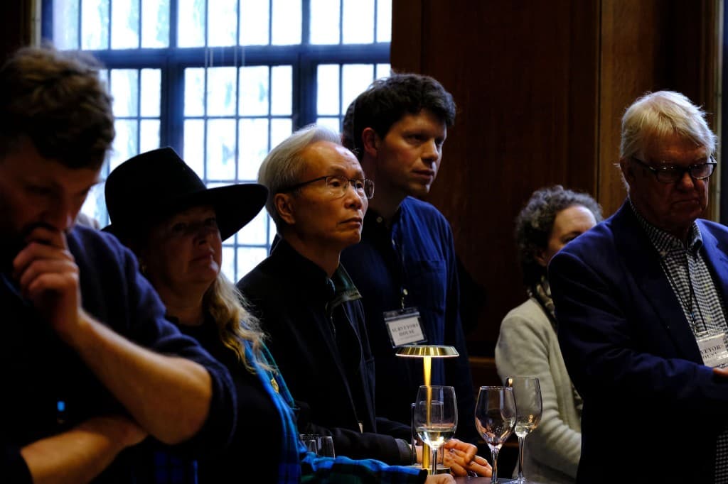 Attendees listening intently