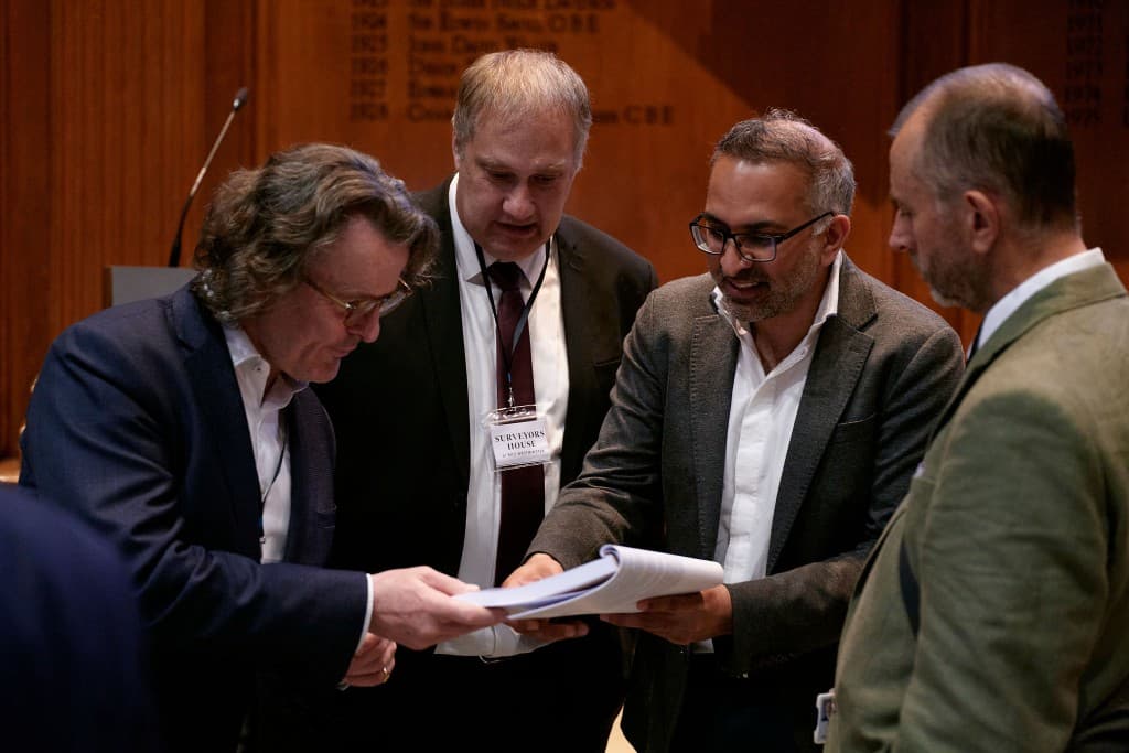 Industry leaders reviewing the report